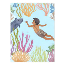 Um menino solto mergulhando na caribe