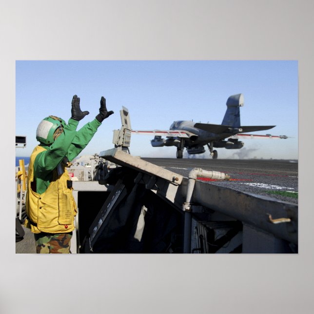 Pôster Um prowler EA-6B é lançado da cabina de pilotagem (Frente)