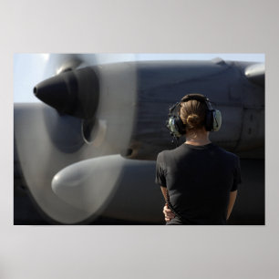 Pôster Um soldado monitora o desempenho