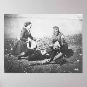 Pôster Uma enfermeira que tende um homem ferido