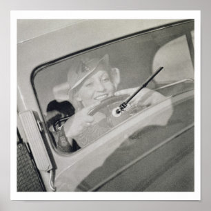 Pôster Uma mulher que conduz, c.1930s (fotogravura)