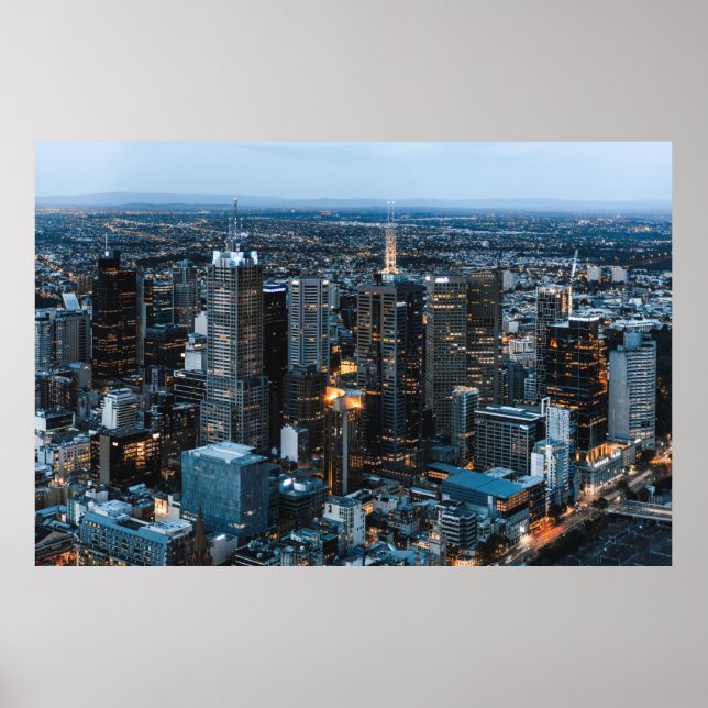 POSTER VISTA AERIAL DOS EDIFÍCIOS CIDADÃOS DURANTE A NOIT (Frente)