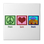 Praia do amor da paz<br><div class="desc">Um sinal de paz,  coração,  e uma praia bonito.</div>