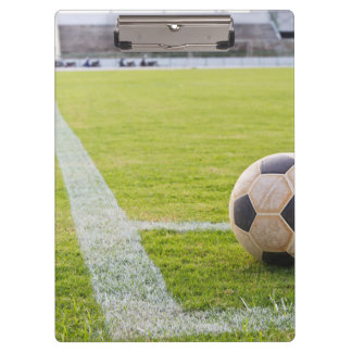 Pranchetas Bola de futebol na linha de campo
