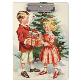 Pranchetas Boy and girl giving each other Christmas presents
