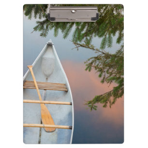 Pranchetas Canoa no lago ao pôr do sol, Canadá