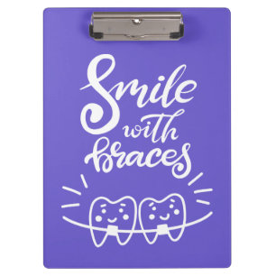 Pranchetas Sorriso com os dentes de sorriso das cintas