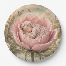 Bebê dormindo em flor rosa