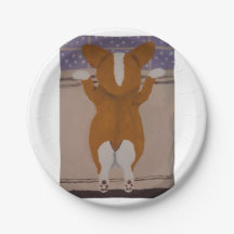 Corgi olhando pela janela