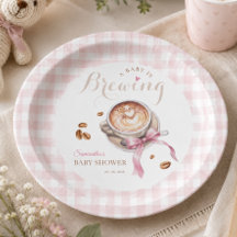 Um bebê está preparando café chá de bebê laço rosa