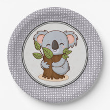 Urso caola abraçado em árvore