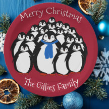 Pratos de festa de Natal da família de pinguins fo