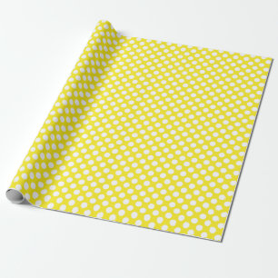 Presente Bolinhas branca no papel de enrolamento amarelo