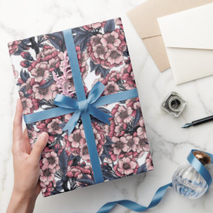 Presente Cereja floresce em papel de embalagem rosa e azul