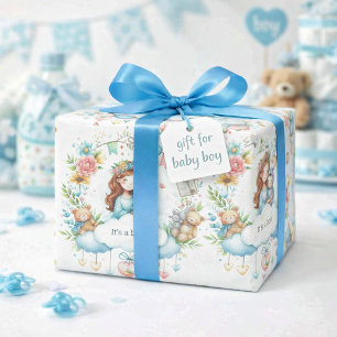Presente Chá de fraldas É um papel de enrolar azul-menino