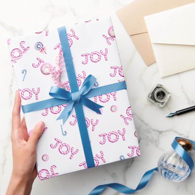 Presente Doces cor-de-rosa com papel embrulhado de Natal (Criador carregado)