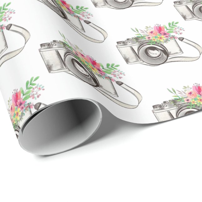 Presente Flores e câmera em papel branco de empacotamento (Ponta do rolo)