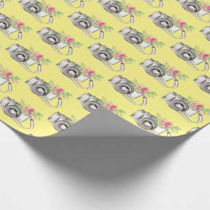 Presente Flores e câmeras em papel de embalagem amarelo