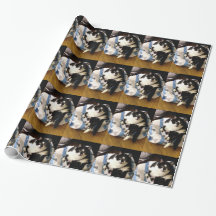 Foto de Tuxedo Cat no papel de moldagem de Natal