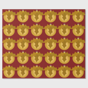 Presente Ornament Dourado e Holly no papel de enrolamento v