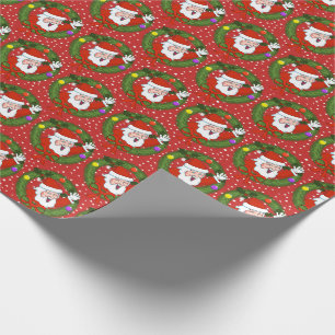 Presente Papai noel na grinalda com papel de envolvimento