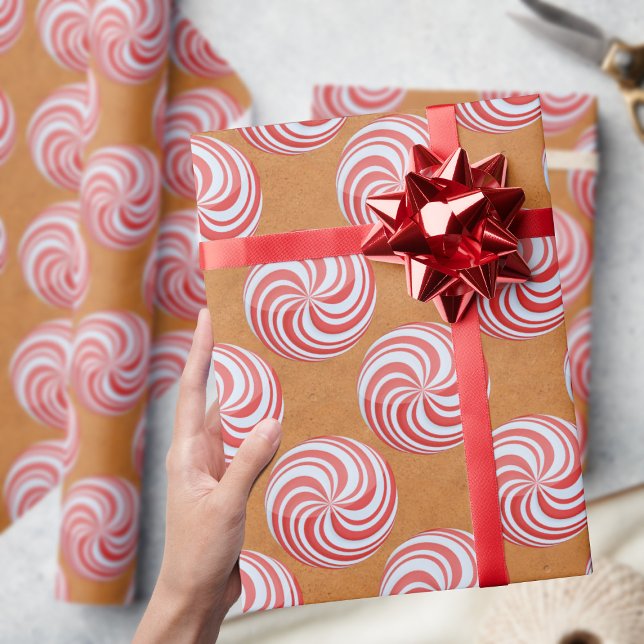 Presente Papel de enrolamento do padrão de menta-pimenta de (A fun and festive peppermint swirl on a gingerbread background. Perfect for Christmas gifts)