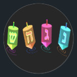 Quatro adesivos Dreidels<br><div class="desc">Quatro sonhos multicoloridos mostrando freira,  gimel,  hei e brilho. Nes Gadol Hayah Sham. Um design Chanukah.</div>
