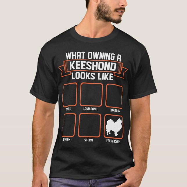 Que cão possuindo do Keeshond olha como a camiseta (Frente)