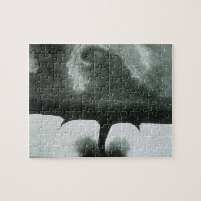 Quebra-cabeça A fotografia conhecida a mais velha de um furacão (Horizontal)