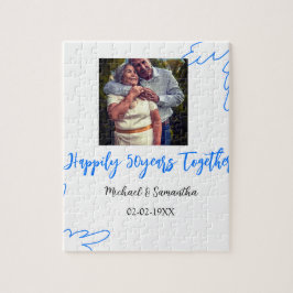 Quebra-cabeça anima o nome da foto azul de folha de 50 anos