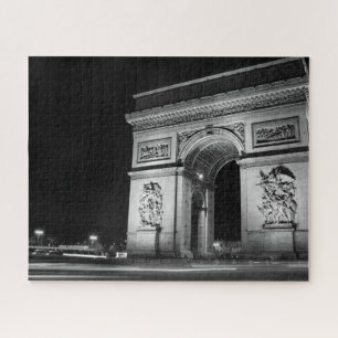Quebra-cabeça Arc de Triomphe at night in Paris