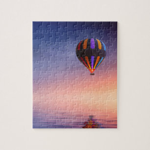 Quebra-cabeça Balão de ar quente sobre o oceano no por do sol