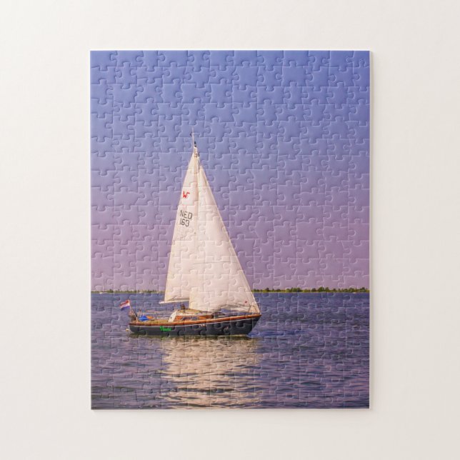 Quebra-cabeça Belo barco à vela ao pôr do sol, Países Baixos (Vertical)