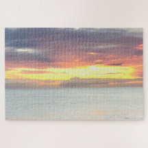 Belo Sol amarelo-alaranjado oceano céu