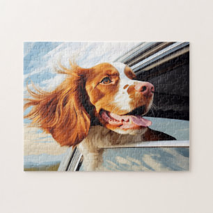 Quebra-cabeça Brittany spaniel na janela do carro