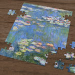 Quebra-cabeça Claude Monet // Lírios De Água<br><div class="desc">Water Lily é uma série de aproximadamente 250 pinturas de óleo pelo impressionista francês Claude Monet (1840-1926). As pinturas retratam o jardim floral de Monet em Giverny e foram o principal foco da produção artística de Monet nos últimos 30 anos de sua vida.</div>