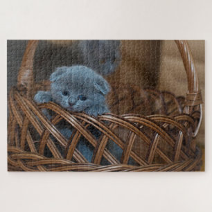 Quebra-cabeça Cute kitten in a basket