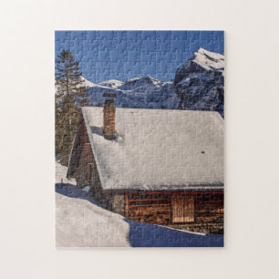 QUEBRA-CABEÇA DE JIGSAW COBERTO PELA NEVE CABINA