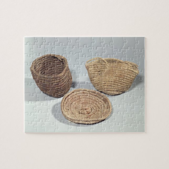 Quebra-cabeça Duas cestas e um cobrir (frondas tecidas da palma) (Horizontal)