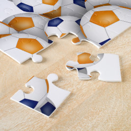 Quebra-cabeça equipe de laranja azul colorido futebol feminino