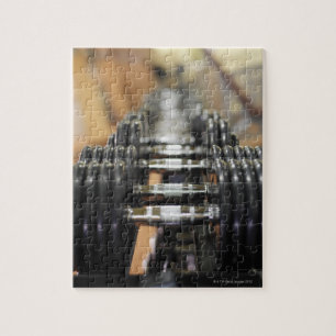 Quebra-cabeça Fim-acima de uma fileira dos dumbbells