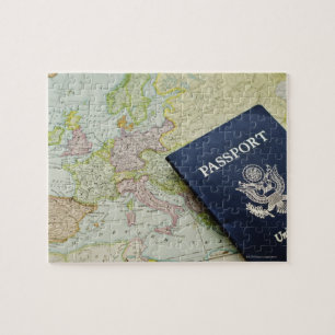 Quebra-cabeça Fim-acima do passaporte que encontra-se no mapa