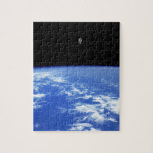 Quebra-cabeça Foto de astronauta da NASA com mochila a jato em c