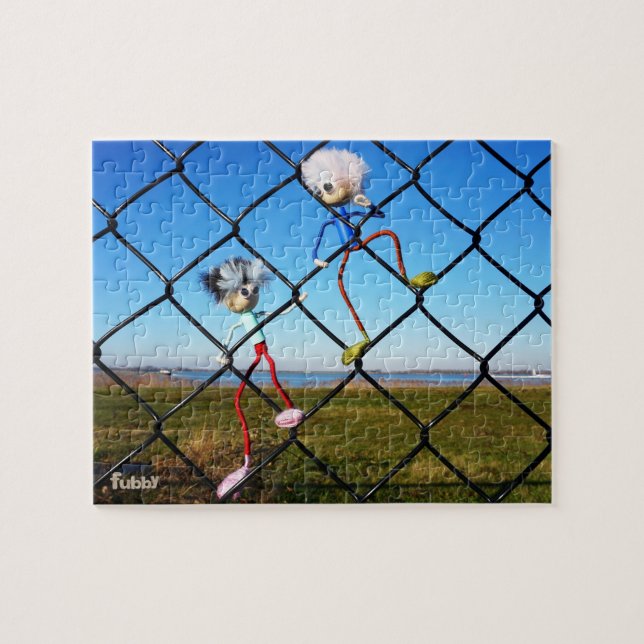 Quebra-cabeça Fubby's die een hek beklimmen. (Horizontal)