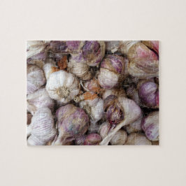 Quebra-cabeça Fundo cor-de-rosa com bolbos de alho inteiros