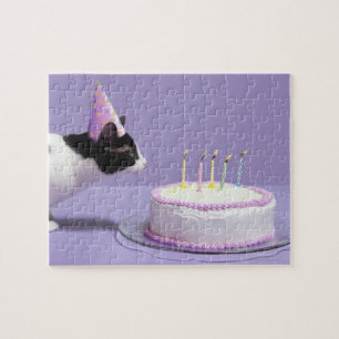 Quebra-cabeça Gato que veste o chapéu do aniversário que funde