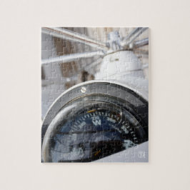 Quebra-cabeça Kompas dat de richting geeft aan een avontuur. 