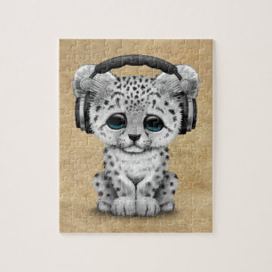 Quebra-cabeça Leopardo de neve bonito Cub DJ que veste fones de