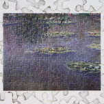 Quebra-cabeça Lírios de Claude Monet, Impressionismo venenoso<br><div class="desc">Lírios de Claude Monet é uma pintura típica de arte do impressionismo vintage que apresenta lírios em um lago no jardim de Monet em sua casa em Giverny, França. Uma árvore pende sobre a lagoa enquanto o céu está refletindo na água. Uma série de mais de 250 pinturas de flores...</div>