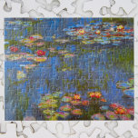 Quebra-cabeça Lírios de Claude Monet, Vintage Nature Art<br><div class="desc">Lírios de Claude Monet é uma pintura típica de arte impressionista vintage, com flores aquáticas em um lago no jardim de Monet em sua casa em Giverny, França. Flores bonitas flutuam na água e árvores salgadas verdes chorando estão lançando um reflexo. Claude Monet gostava de pintar "en plein air" ou...</div>